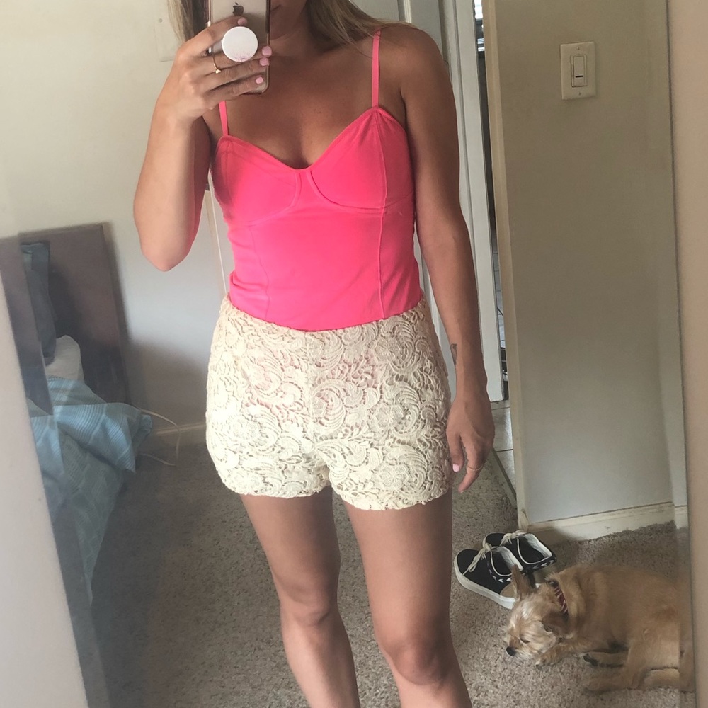 Hot Pink top and white crochet shorts from UO